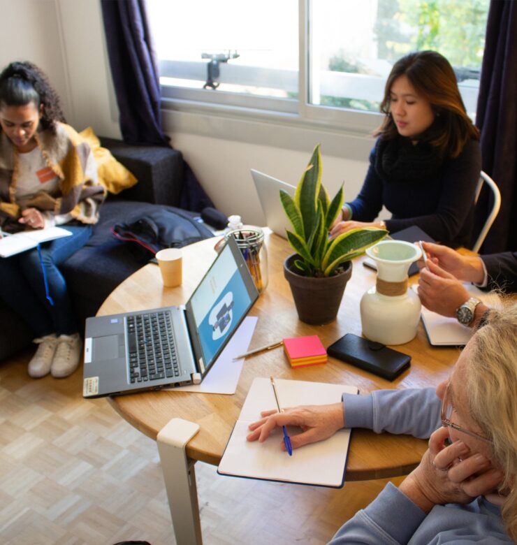 Our recruitment teams meeting around a table